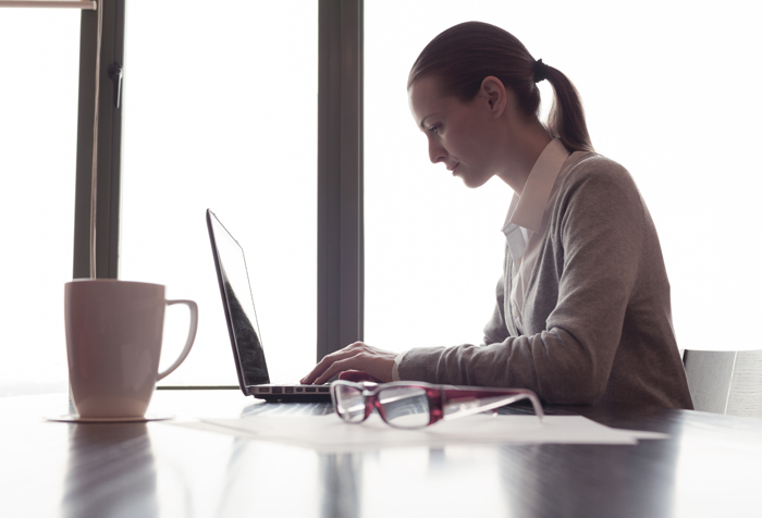 Relaxed HR Professional Reviewing Performance Feedback Relaxed HR Professional Reviewing Performance Feedback